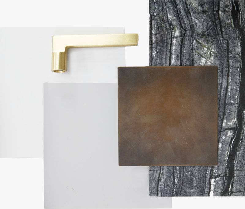 A collection of materials used in the powder room layered on top of each other
